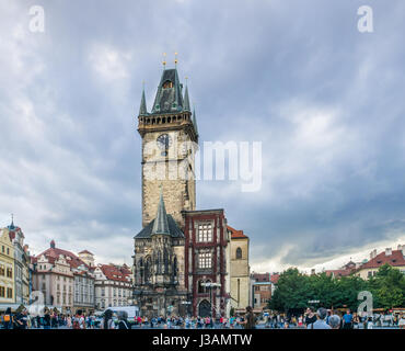 Tourists and performers throng the Old Town Square in Prague, Czech Republic, which is one of the most popular tourist destinations in Europe. Stock Photo