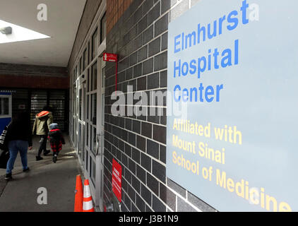 New York, USA. 13th Mar, 2017. People walk into a hospital in New York, the United States on March 13, 2017. U.S. Republican-controlled House of Representatives on Thursday pushed through a new version of the American Health Care Act aimed to repeal and replace major parts of Obamacare, by a vote of 217-213. Credit: Wang Ying/Xinhua/Alamy Live News Stock Photo