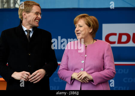 Eckernforde, Germany. 05th May, 2017. German Chancellor Angela Merkel stands next to the CDU's lead candidate for the 07 May Landtag (state parliament) election, Daniel Gunther, during a CDU campaign event in in Eckernforde, Germany, 05 May 2017. Photo: Carsten Rehder/dpa/Alamy Live News Stock Photo