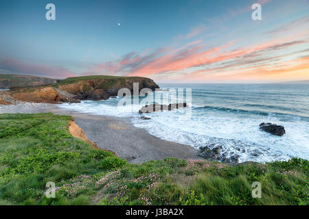 Dusk over Church Cove at Gunwalloe on the Cornwall coast Stock Photo