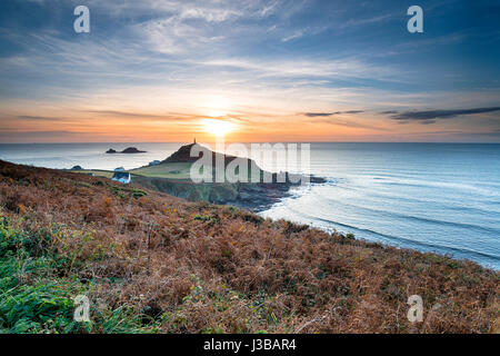 Sunset over Cape Cornwall from the South West Coast Path on the Cornish coastline Stock Photo