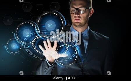 businessman touching virtual projection Stock Photo