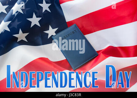 independence day words, american flag and passport Stock Photo