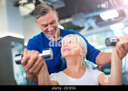 Seniors doing fitness exercises Stock Photo