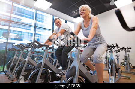 Seniors doing fitness exercises Stock Photo