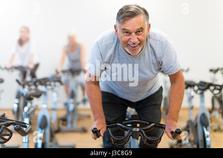 Seniors doing fitness exercises Stock Photo