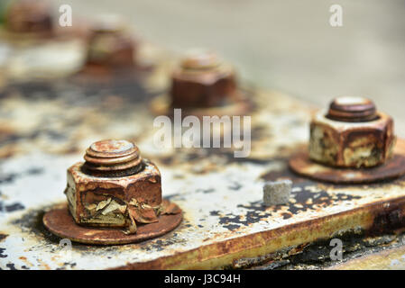 Soft focus of Corrosive rusted bolt with nut.Rusty Old Industrial Screw Nut and Bolt Stock Photo