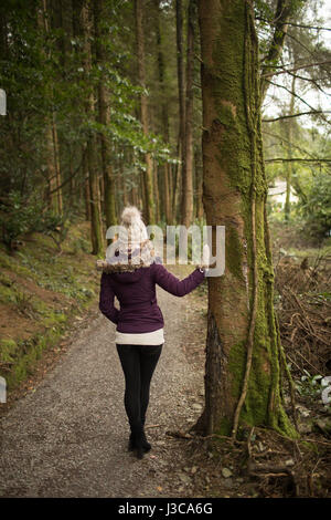 Rear View of a Standing Woman Stock Photo - Alamy