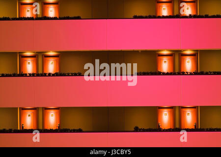 Illuminated balconies and hotel room doors in the inner courtyard of the Sofitel hotel, Budapest, Hungary, Eastern Europe. Stock Photo