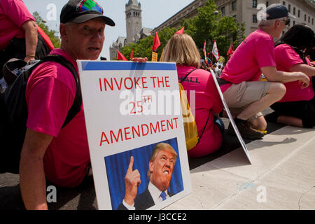 2017 People's Climate March (man holding sign which reads: 'Invoke the 25th Amendment) - Washington, DC USA Stock Photo