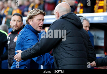 Bradford City manager Stuart McCall and Fleetwood Town manager Uwe rosler shake hands before kick off of the Sky Bet League One Play-off, first leg, match at Valley Parade, Bradford. Stock Photo