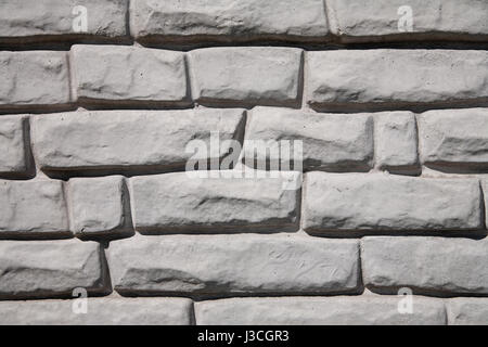 Backgrounds. This picture shows the stone gray, granite wall Stock Photo