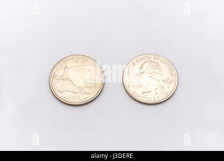 Closeup to Maine State Symbol on Quarter Dollar Coin on White Background Stock Photo