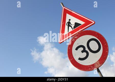 Dutch road sign: speed limit 30 km / h in combination with roadworks ahead Stock Photo