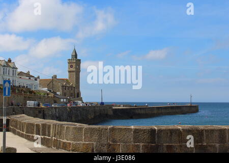 View out to sea past the Bickford-Smith Institute and pier at Porthleven, Cornwall; UK Stock Photo