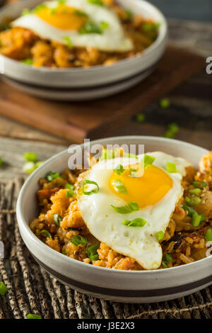 Homemade Korean Kimchi Fried Rice with an Egg Stock Photo