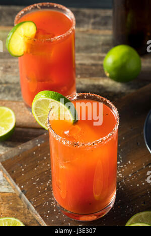 Homemade Michelada with Beer Salted Rim and Tomato Juice Stock Photo