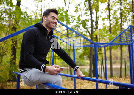 Sporty Man Taking Break During Training Stock Photo