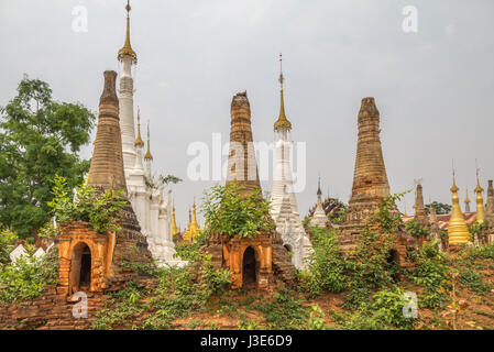 Some of the overgrown stupas, Shwe Inn Thein Pagoda, Myanmar Stock Photo