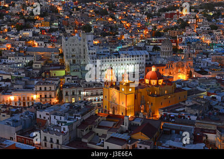 Close up of the skyline of Guanajuato City at night with the Our Lady of Guanajuato Basilica and its Spanish colonial style architecture, Mexico. Stock Photo