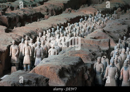 Xian, China - August 6, 2012: Ranks of Army Terracota Warriors in the archaeological site near Xian, China Stock Photo