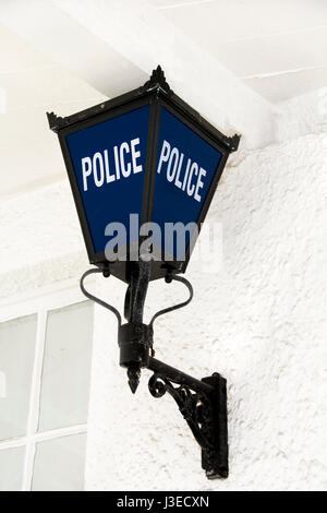 Traditional blue police lamp outside police station Stock Photo