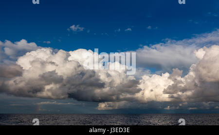 Late evening sunlight on clouds over the North Sea Stock Photo
