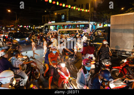 Hoi An, Vietnam - march 11 2017: totally jammed crossroad. People came to the city to celebrate Full Moon Festival on huge numbers of scooters, which  Stock Photo