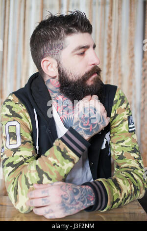 Heavily tattooed man Stock Photo - Alamy