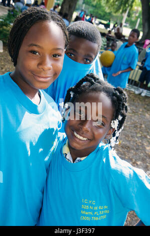 Miami Florida,Little Haiti,Range Park,Back to School Black girl girls,youngster,female kids children friends Inner City Youth Center,centre,ICYC,urban Stock Photo