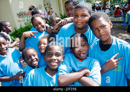 Miami Florida,Little Haiti,Range Park,Back to School Black boy boys,male kid kids child children youngster,girl girls female,group,student students pu Stock Photo