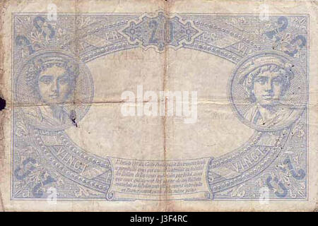 This is a 20 Francs coin from France, issued in 1874, showcasing historical French currency and offering insight into the countryâ€™s monetary system of the 19th century. Stock Photo