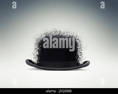 a black bowler hat isolated on gradiant background shattered Stock Photo