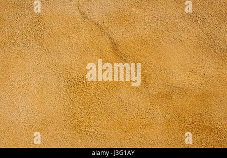 Mediterranean wall background, terracotta orange colored texture. Stock Photo