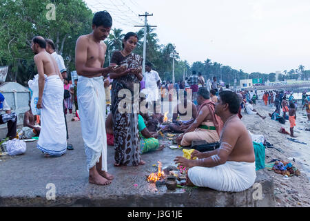 Rameswaram, Tamil Nadu, India - May 25, 2014. Full report about Rameswaram pilgrimage, religion. Religious city rituals. Priest on the beach side, off Stock Photo