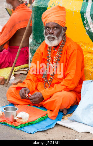 Rameswaram, Tamil Nadu, India - May 25, 2014. Full report about Rameswaram pilgrimage, religion. Religious city rituals. Priest on the beach side, off Stock Photo