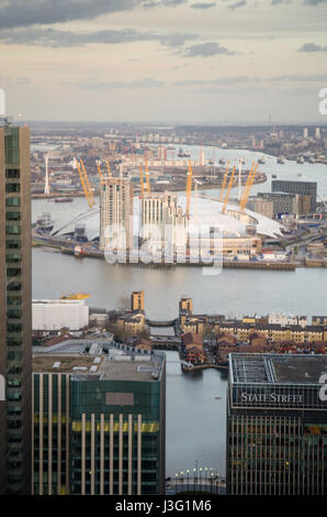 London, England, UK - February 27, 2015: The O2 Arena Millennium Dome dominates the North Greenwich peninsula in a meander in the River Thames, amongs Stock Photo