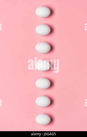 top view of row of white eggs for easter. Happy Easter concept Stock Photo