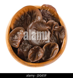 Fresh black fungus in wooden bowl. Auricularia auricula-judae, also known as Jew's ear, wood and jelly ear, and Mu Err. Ingredient in Chinese dishes. Stock Photo