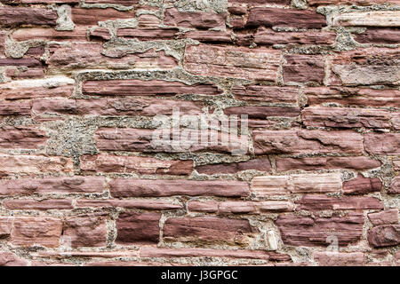 Old walls built with red sandstone from the Weserbergland, Krukenburg Castle, Helmarshausen, Bad Karlshafen, Hesse, Germany, Europe Stock Photo