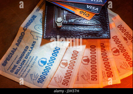 Wallet with notes of Zimbabwe billion dollars Stock Photo
