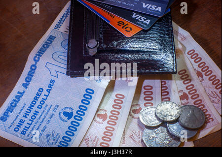 Wallet with notes of Zimbabwe billion dollars Stock Photo
