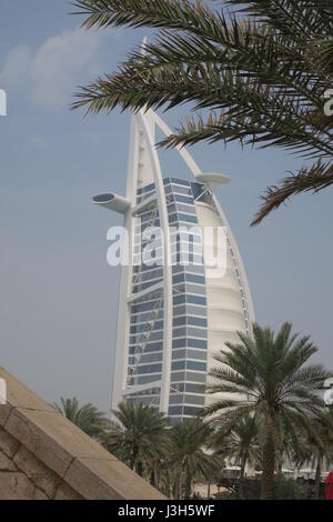 Famous hotel Burj al Arab, located on an island of reclaimed land, was opened in 1999. It's the world's third tallest hotel. Stock Photo