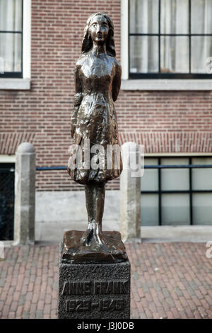 Statue of Anne Frank in Amsterdam, Netherlands. The statue by Dutch sculptor Mari Andriessen near Westerkerk church. Stock Photo