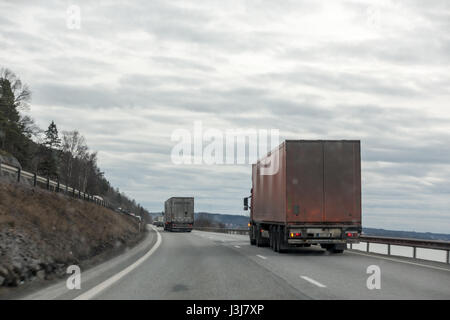 Road construction trucks on tah freeway Stock Photo