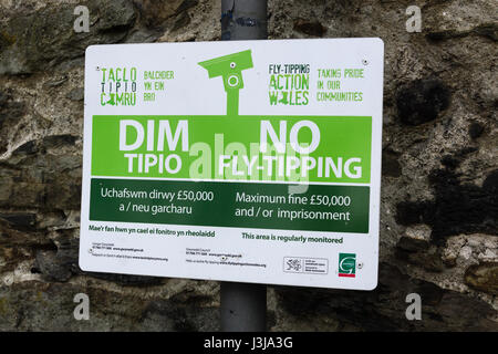 Fly Tipping Action Wales environmental crime enforcement notice in English and Welsh posted by Gwynedd Council in Bala Wales Stock Photo
