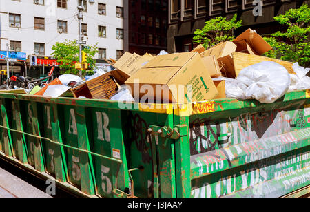 New York City Manhattan container Over flowing Dumpsters being full with garbage Stock Photo