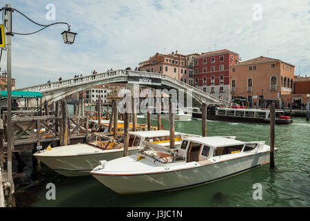 Spring day on Grand Canal in Venice. Scalzi Bridge in the background. Stock Photo