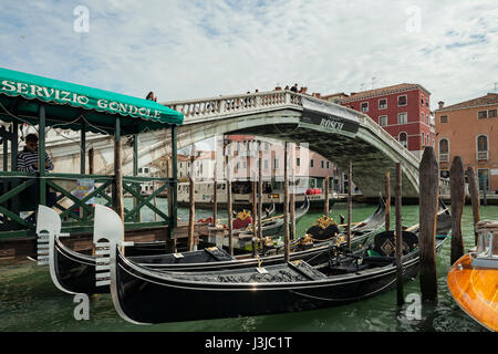 Gondolas on Grand Canal in Venice. Scalzi bridge in the background. Stock Photo