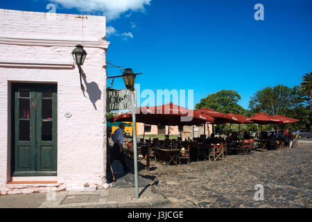 People enjoying lunch at outdoor restaurant historic colonial quarter Colonia del Sacramento Uruguay Stock Photo